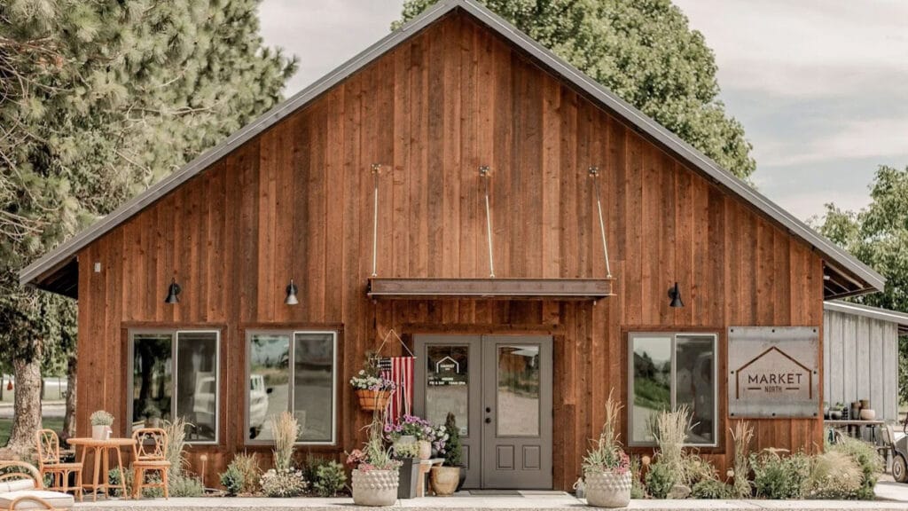 Rustic wooden building with sign 'Market North'.